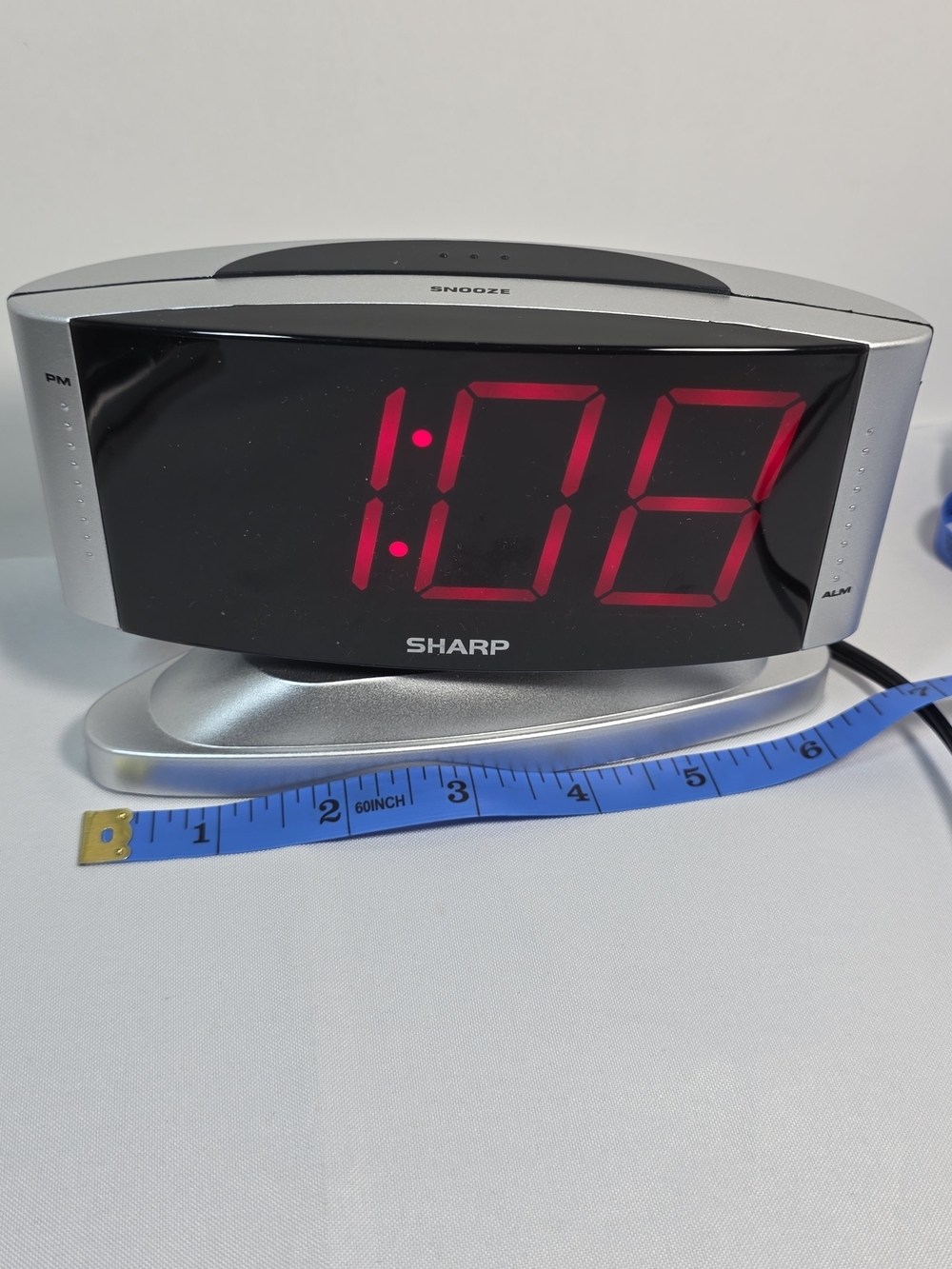 Sharp SPC033 Digital Alarm Clock -Large Red LED Display, Silver (Battery Backup)